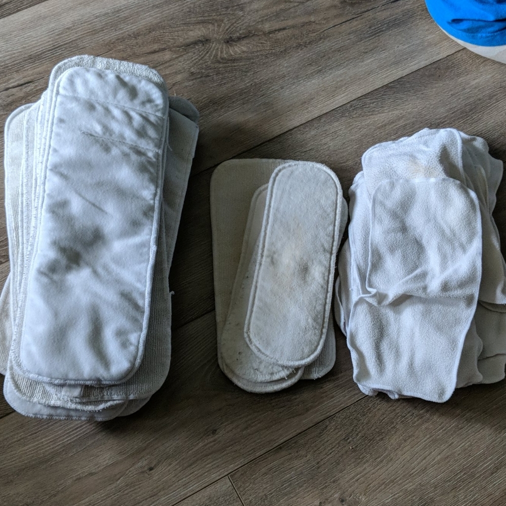 Cloth diaper inserts, boosters, and wipes